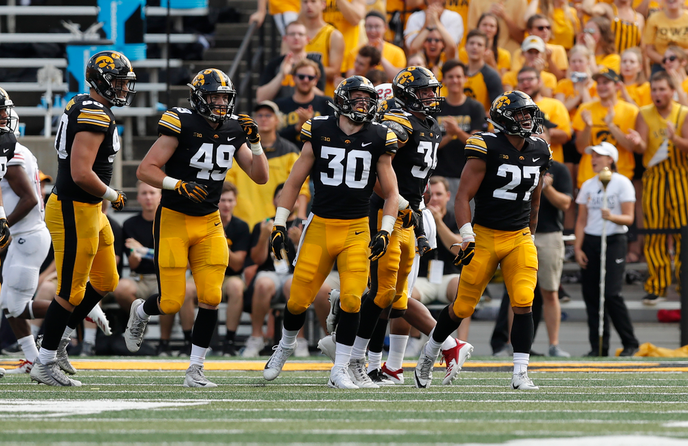 Iowa Hawkeyes defensive back Amani Hooker (27) celebrates after intercepting a pass against the Northern Illinois Huskies Saturday, September 1, 2018 at Kinnick Stadium. (Brian Ray/hawkeyesports.com)