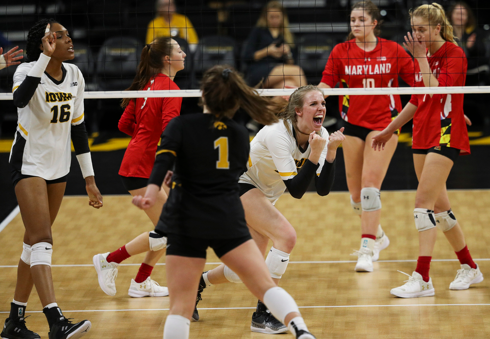 Iowa Hawkeyes middle blocker Hannah Clayton (18) celebrates after winning a point during a match against Maryland at Carver-Hawkeye Arena on November 23, 2018. (Tork Mason/hawkeyesports.com)