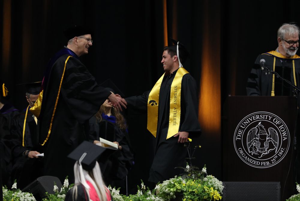 Iowa WrestlingÕs Perez Perez during the College of Liberal Arts and Sciences spring commencement Saturday, May 11, 2019 at Carver-Hawkeye Arena. (Brian Ray/hawkeyesports.com)