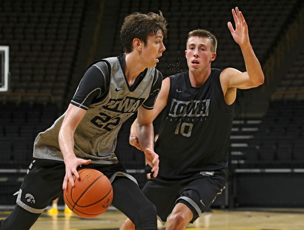 Iowa Hawkeyes forward Patrick McCaffery (22) drives in on guard Joe Wieskamp (10) during practice at Carver-Hawkeye Arena in Iowa City on Monday, Sep 30, 2019. (Stephen Mally/hawkeyesports.com)