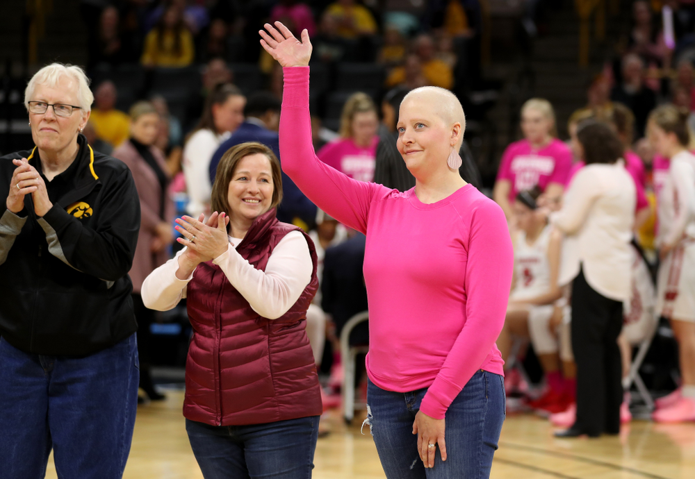 Women affected by cancer are introduced during the Iowa Hawkeyes game against the Wisconsin Badgers Sunday, February 16, 2020 at Carver-Hawkeye Arena. (Brian Ray/hawkeyesports.com)