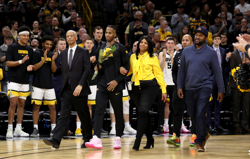 Iowa Hawkeyes guard Bakari Evelyn (4) and his family during senior night festivities before their game against the Purdue Boilermakers Tuesday, March 3, 2020 at Carver-Hawkeye Arena. (Brian Ray/hawkeyesports.com)