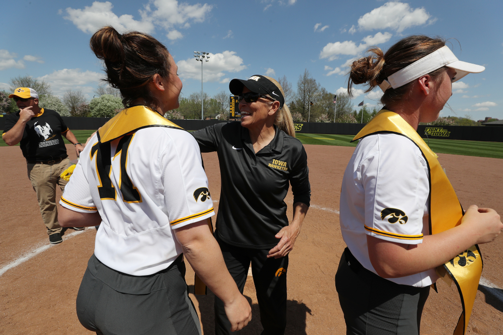 Iowa Hawkeyes Mallory Kilian (11) and Head Coach Renee Gillispie during senior day festivities following their game against the Ohio State Buckeyes Sunday, May 5, 2019 at Pearl Field. (Brian Ray/hawkeyesports.com)ic