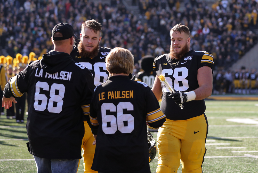 Iowa Hawkeyes offensive lineman Landan Paulsen (68) and offensive lineman Levi Paulsen (66) during Senior Day festivities before their game against the Illinois Fighting Illini Saturday, November 23, 2019 at Kinnick Stadium. (Brian Ray/hawkeyesports.com)
