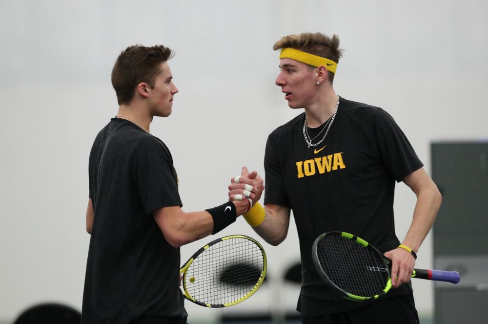 Iowa's Nikita Snezhko and Joe Tyler play a doubles match against UMKC Friday, February 15, 2019 at the Hawkeye Tennis and Recreation Complex. (Brian Ray/hawkeyesports.com)