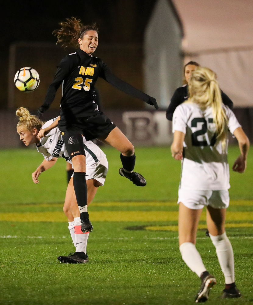 Iowa Hawkeyes midfielder Josie Durr (25) heads the ball during a game against Michigan State at the Iowa Soccer Complex on October 12, 2018. (Tork Mason/hawkeyesports.com)