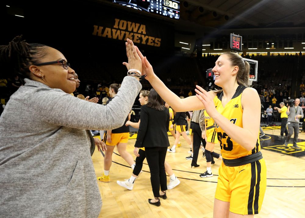 Iowa Hawkeyes forward Amanda Ollinger (43) and assistant coach Raina Harmon against the Minnesota Golden Gophers Thursday, February 27, 2020 at Carver-Hawkeye Arena. (Brian Ray/hawkeyesports.com)