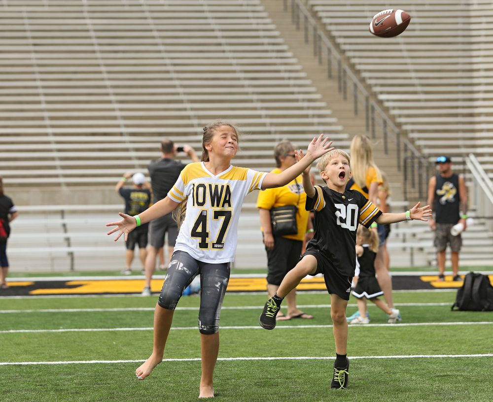 Junior Hawk Club members participate in the Swarm Experience during Kids Day at Kinnick Stadium in Iowa City on Saturday, Aug 10, 2019. (Stephen Mally/hawkeyesports.com)