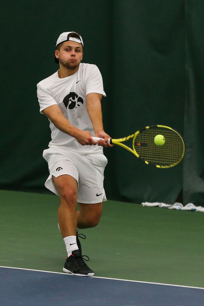 Iowa’s Will Davies hits a forehand during the Iowa men’s tennis match vs Western Michigan on Saturday, January 18, 2020 at the Hawkeye Tennis and Recreation Complex. (Lily Smith/hawkeyesports.com)