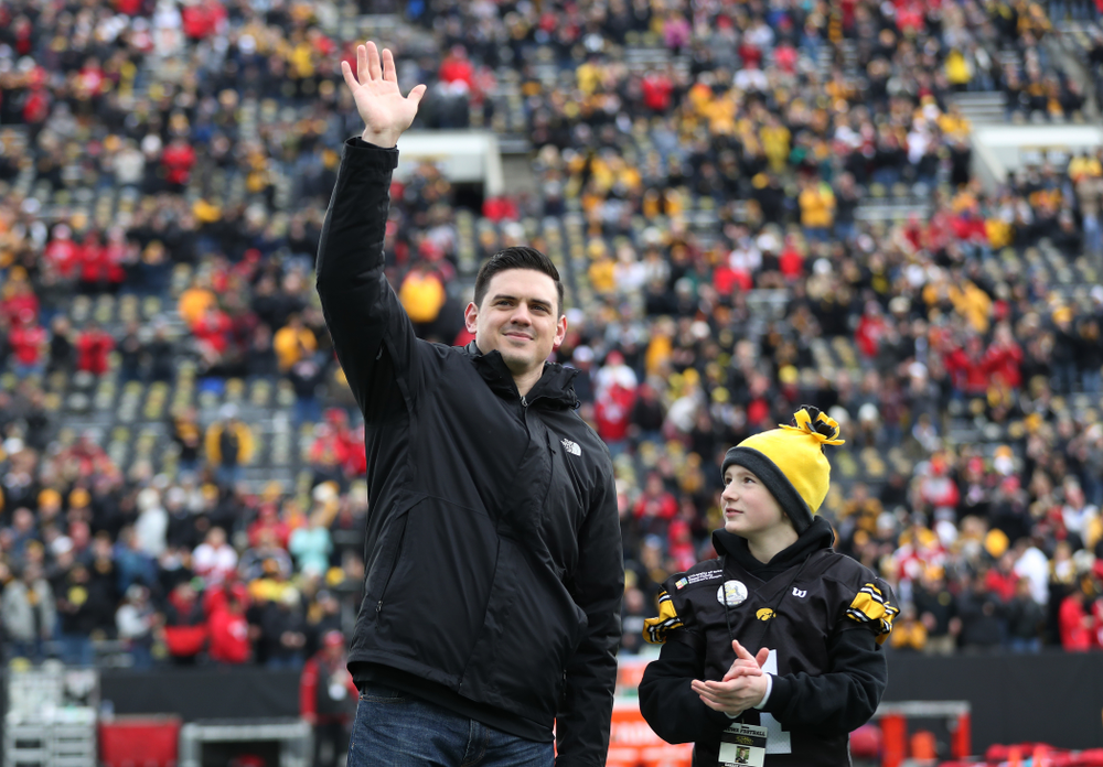 Honorary captain James Morris and Stead Family Children's Hospital Kid Captain Garret Schuster before their game against the Nebraska Cornhuskers Friday, November 23, 2018 at Kinnick Stadium. (Brian Ray/hawkeyesports.com)