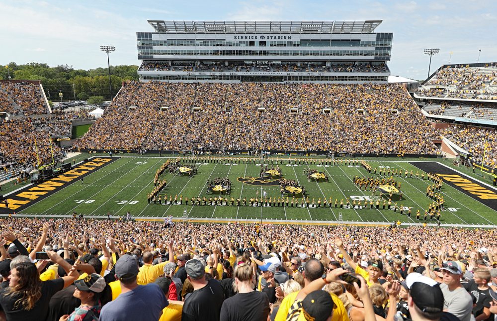 People look on as the Pat Green performs “Wave on Wave” during the second quarter of their Big Ten Conference football game at Kinnick Stadium in Iowa City on Saturday, Sep 7, 2019. (Stephen Mally/hawkeyesports.com)