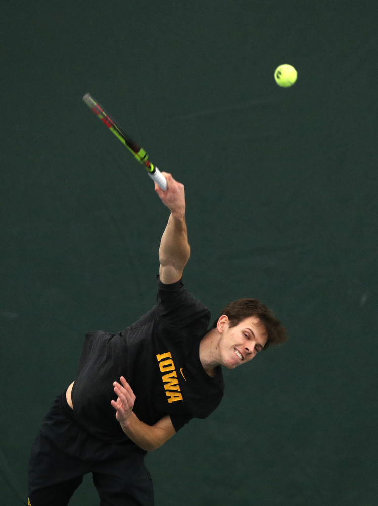 Piotr Smietana against the Miami Hurricanes Friday, February 8, 2019 at the Hawkeye Tennis and Recreation Complex. (Brian Ray/hawkeyesports.com)