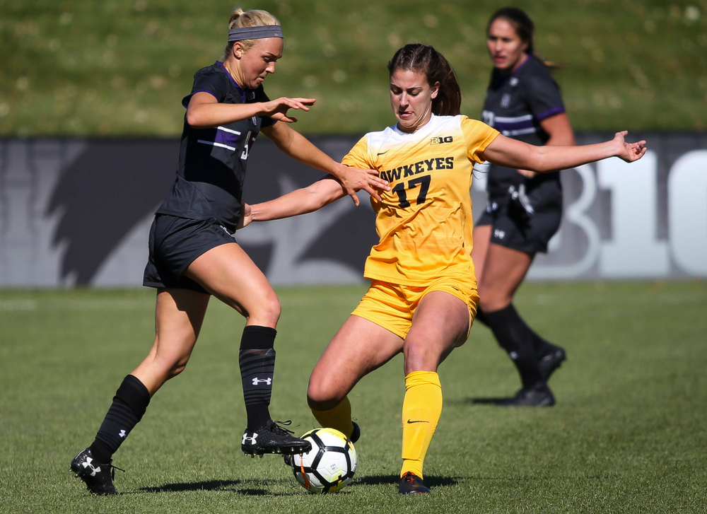 Iowa Hawkeyes defender Hannah Drkulec (17) makes a tackle during a game against Northwestern at the Iowa Soccer Complex on October 21, 2018. (Tork Mason/hawkeyesports.com)