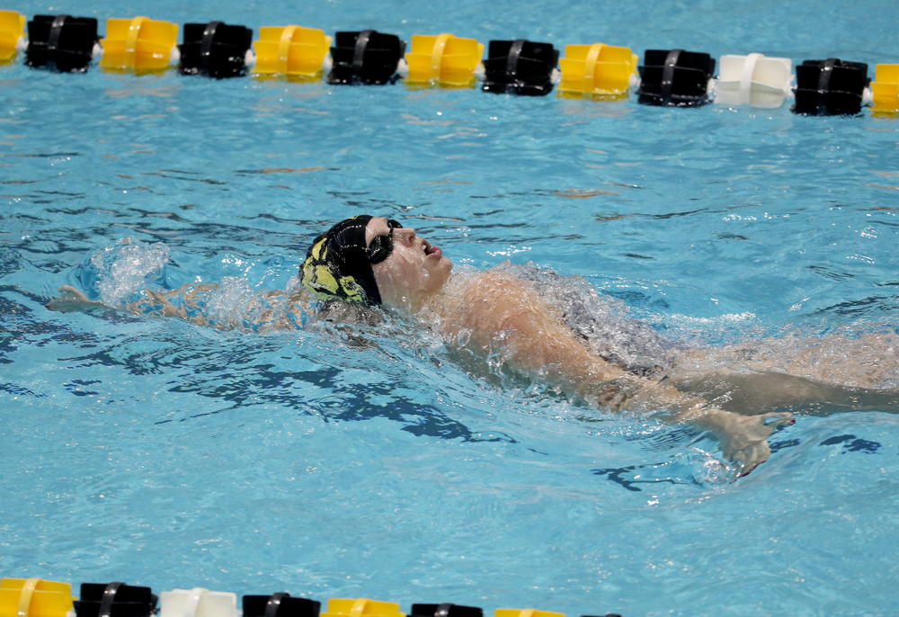 IowaÕs Julia Koluch competes in the 100 yard backstroke against Notre Dame and Illinois Saturday, January 11, 2020 at the Campus Recreation and Wellness Center. (Brian Ray/hawkeyesports.com)