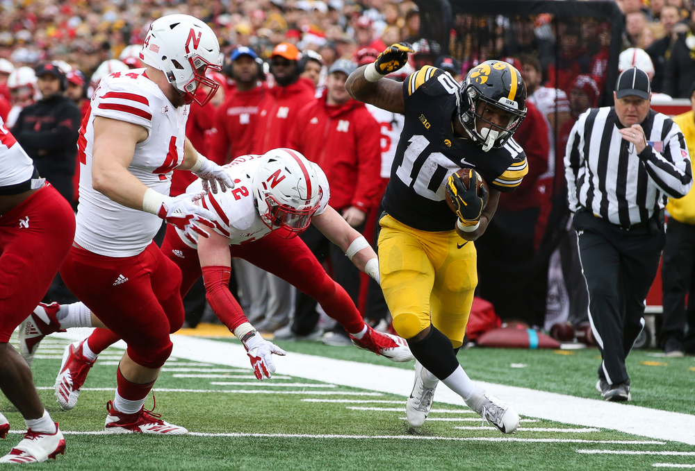 Iowa Hawkeyes running back Mekhi Sargent (10) runs the ball during a game against Nebraska at Kinnick Stadium on November 23, 2018. (Tork Mason/hawkeyesports.com)