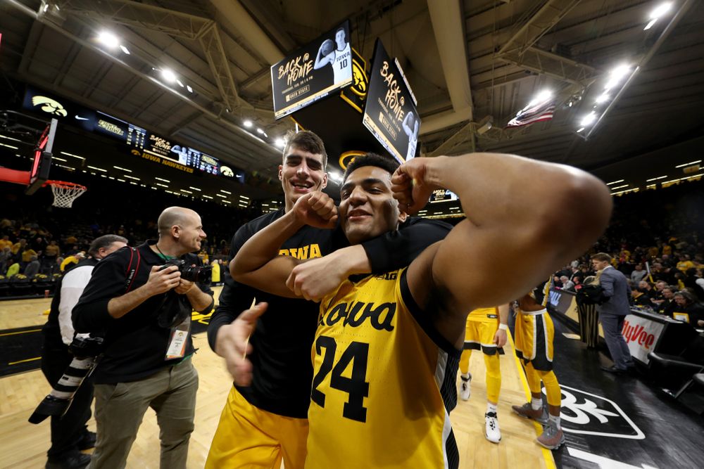 Iowa Hawkeyes forward Luka Garza (55) and Nicolas Hobbs against the Nebraska Cornhuskers Saturday, February 8, 2020 at Carver-Hawkeye Arena. (Brian Ray/hawkeyesports.com)