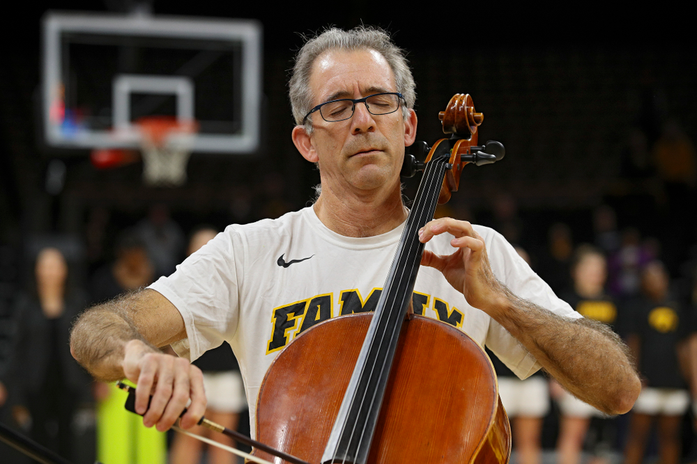 Anthony Arnone performs the National Anthem on his cello before Iowa’s overtime win against Princeton at Carver-Hawkeye Arena in Iowa City on Wednesday, Nov 20, 2019. (Stephen Mally/hawkeyesports.com)