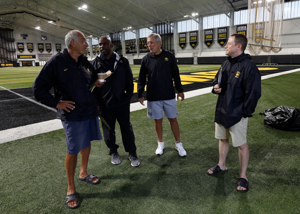 Iowa Hawkeyes head coach Kirk Ferentz talks with the BTN crew during camp practice No. 15 Monday, August 20, 2018 at the Hansen Football Performance Center. (Brian Ray/hawkeyesports.com)