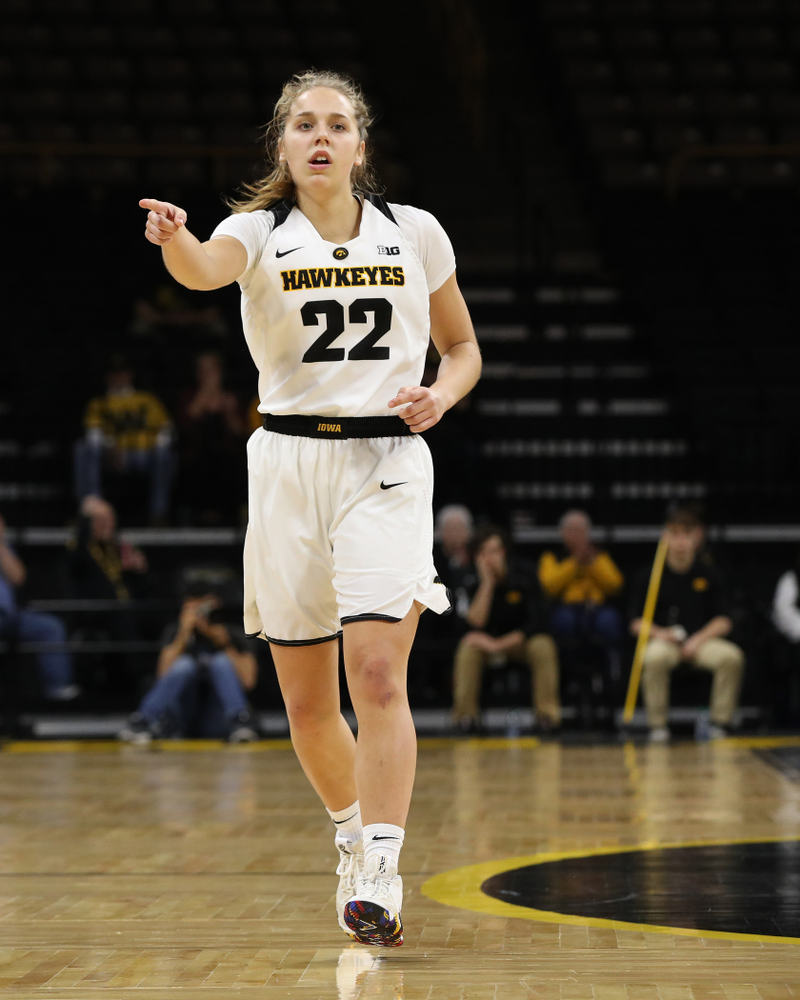 Iowa Hawkeyes guard Kathleen Doyle (22) against the Wisconsin Badgers Monday, January 7, 2019 at Carver-Hawkeye Arena. (Brian Ray/hawkeyesports.com)