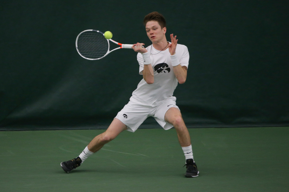 Iowa’s Jason Kerst returns a hit during the Iowa men’s tennis meet vs Nebraska on Sunday, March 1, 2020 at the Hawkeye Tennis and Recreation Complex. (Lily Smith/hawkeyesports.com)