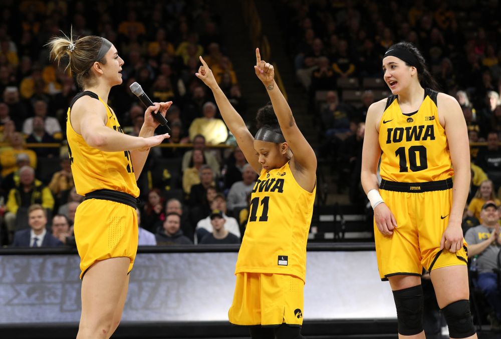 Iowa Hawkeyes forward Megan Gustafson (10), guard Tania Davis (11), and forward Hannah Stewart (21) during senior day ceremonies following their game against the Northwestern Wildcats Sunday, March 3, 2019 at Carver-Hawkeye Arena. (Brian Ray/hawkeyesports.com)