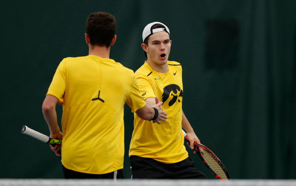 Jonas Larsen and Kareem Allaf play a doubles match against the Illinois Fighting Illini Saturday, March 31, 2018 at Hawkeye Tennis and Recreation Center. (Brian Ray/hawkeyesports.com)