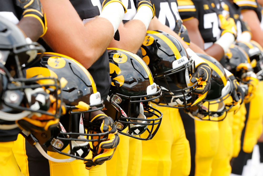 The Iowa Hawkeyes stand for the National Anthem against the Northern Illinois Huskies Saturday, September 1, 2018 at Kinnick Stadium. (Brian Ray/hawkeyesports.com)