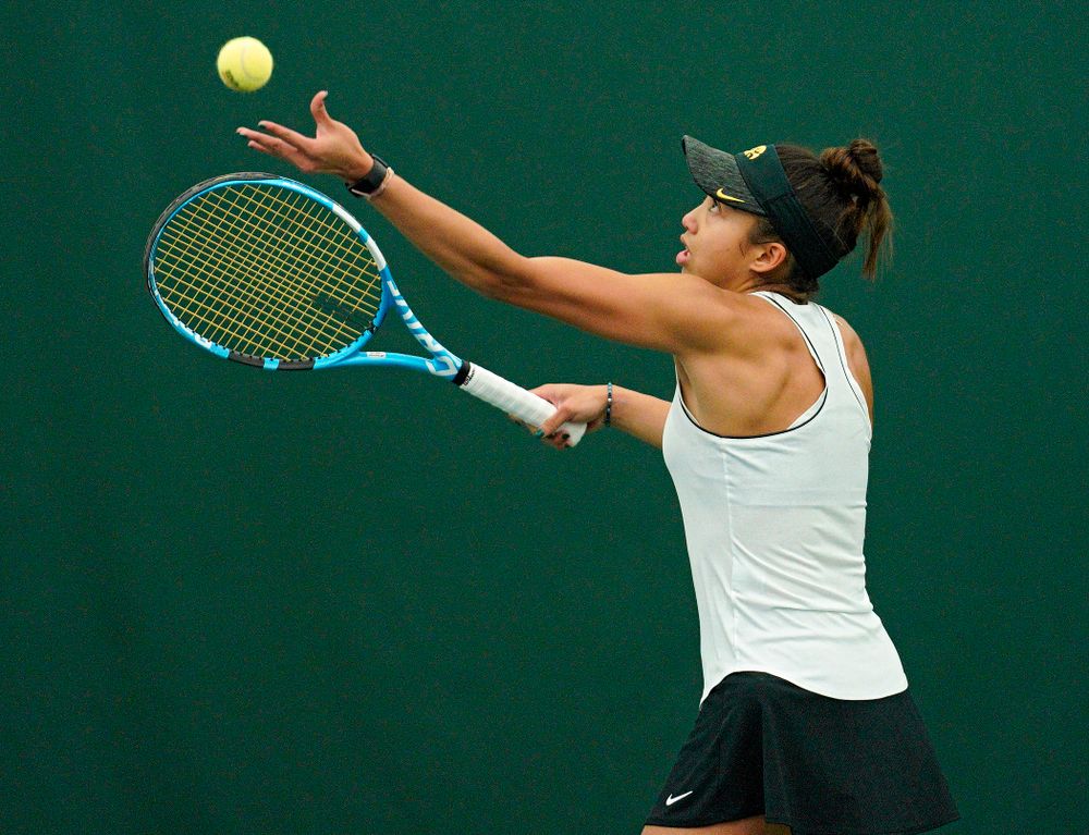 Iowa’s Michelle Bacalla serves during her singles match at the Hawkeye Tennis and Recreation Complex in Iowa City on Sunday, February 16, 2020. (Stephen Mally/hawkeyesports.com)