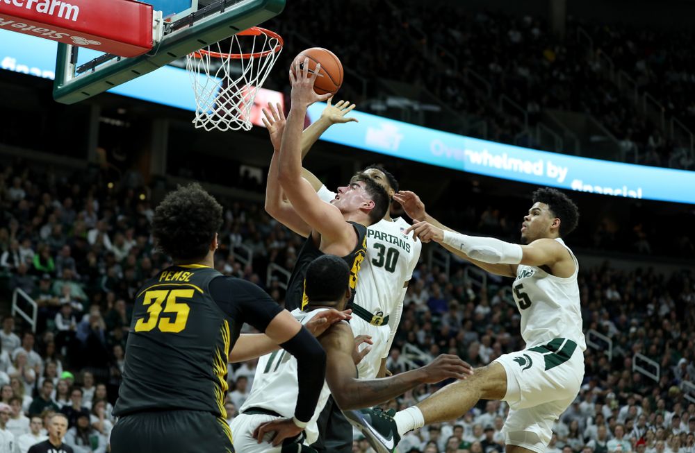 Iowa Hawkeyes forward Luka Garza (55) against Michigan State Tuesday, February 25, 2020 at the Breslin Center in East Lansing, MI. (Brian Ray/hawkeyesports.com)