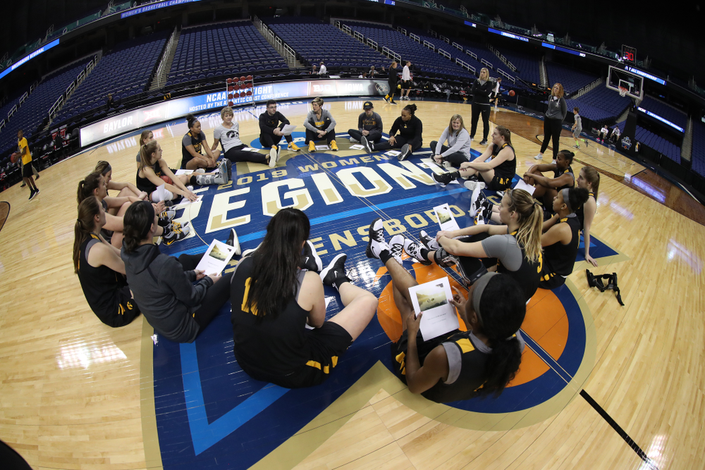 The Iowa Hawkeyes talk in their circle during shoot around before their regional final against the Baylor Lady Bears in the 2019 NCAA Women's College Basketball Tournament Monday, April 1, 2019 at Greensboro Coliseum in Greensboro, NC.(Brian Ray/hawkeyesports.com)