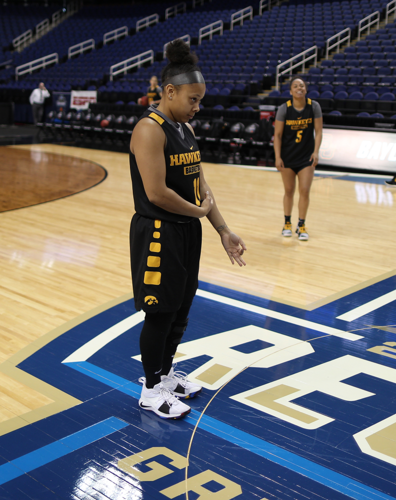 Iowa Hawkeyes guard Tania Davis (11) celebrates after sinking a half court shot during shoot around before their regional final against the Baylor Lady Bears in the 2019 NCAA Women's College Basketball Tournament Monday, April 1, 2019 at Greensboro Coliseum in Greensboro, NC.(Brian Ray/hawkeyesports.com)