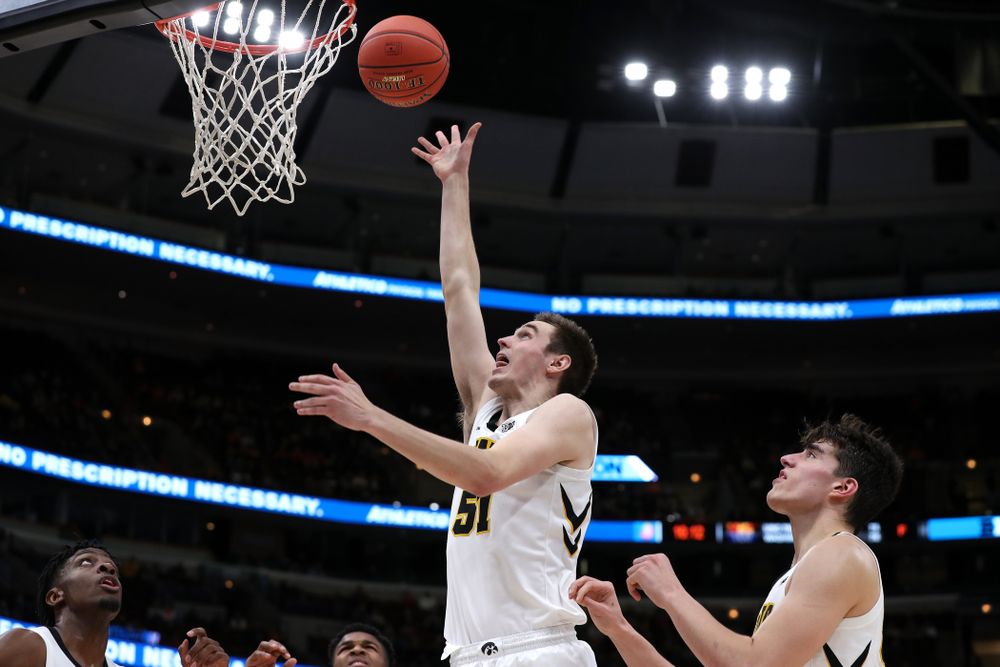 Iowa Hawkeyes forward Nicholas Baer (51) against the Illinois Fighting Illini in the 2019 Big Ten Men's Basketball Tournament Thursday, March 14, 2019 at the United Center in Chicago. (Brian Ray/hawkeyesports.com)