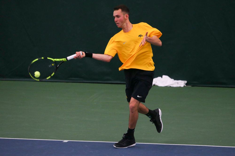 Iowa's Kareem Allaf at a tennis match vs Drake Friday, March 8, 2019 at the Hawkeye Tennis and Recreation Complex. (Lily Smith/hawkeyesports.com)
