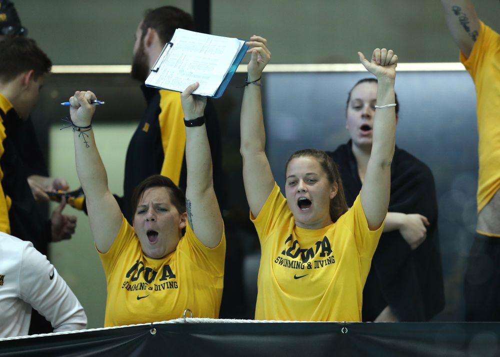 Iowa Hawkeye assistant coaches Sarah Stockwell-Gregson and Ashley Dell Thursday, November 15, 2018 during the 2018 Hawkeye Invitational at the Campus Recreation and Wellness Center. (Brian Ray/hawkeyesports.com)