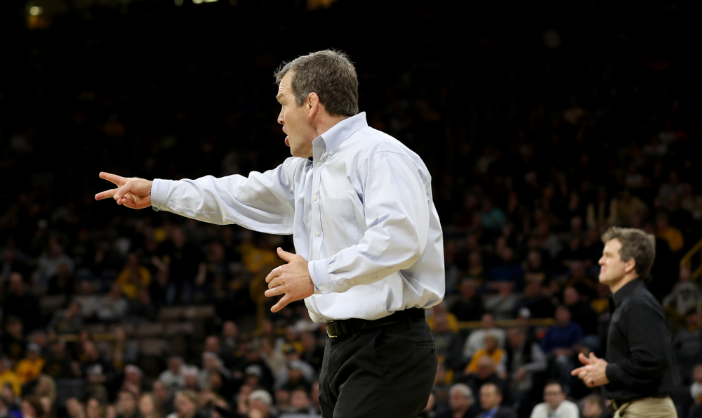 Iowa Hawkeyes head coach Tom Brands calls for a takedown as Kaleb Young wrestles Nebraska’s Peyton Rob at 157 pounds Saturday, January 18, 2020 at Carver-Hawkeye Arena. Young won the match 6-4. (Brian Ray/hawkeyesports.com)