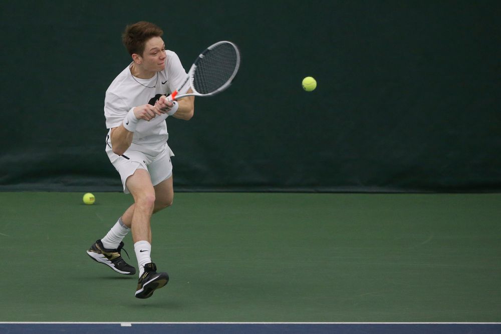 Iowa’s Jason Kerst returns a hit during the Iowa men’s tennis meet vs Nebraska on Sunday, March 1, 2020 at the Hawkeye Tennis and Recreation Complex. (Lily Smith/hawkeyesports.com)
