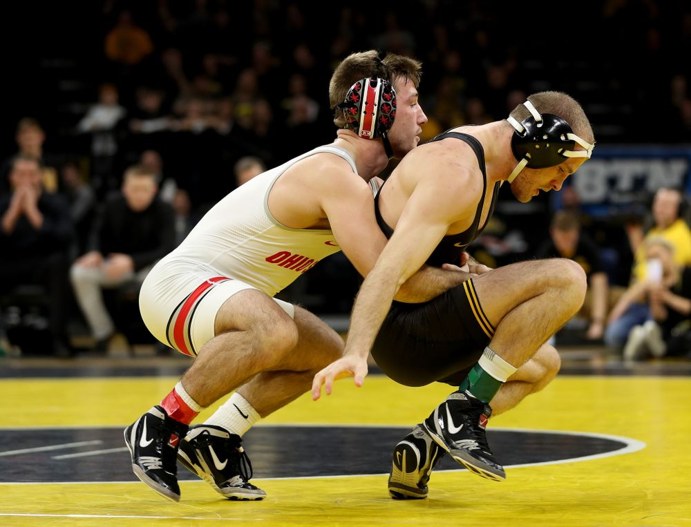 Iowa’s Carter Happel wrestles Ohio State’s Luke Pletcher at 141 pounds Friday, January 24, 2020 at Carver-Hawkeye Arena. Pletcher won the match with a 14-5. (Brian Ray/hawkeyesports.com)