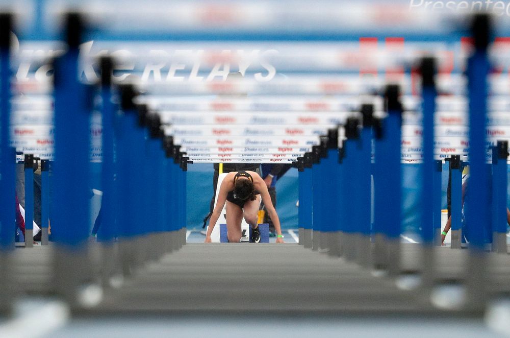 Iowa's Jenny Kimbro waits for the start in the blocks for the women's 100 meter hurdles event during the third day of the Drake Relays at Drake Stadium in Des Moines on Saturday, Apr. 27, 2019. (Stephen Mally/hawkeyesports.com)