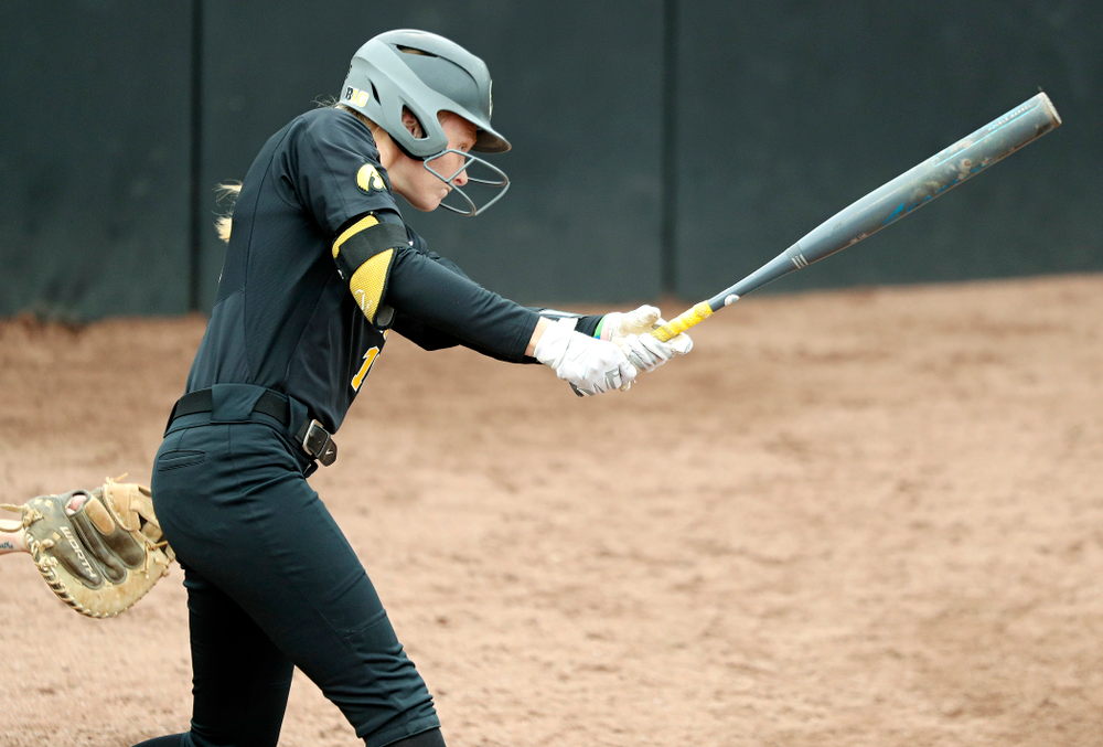 Iowa’s Ashley Hamilton (18) hits an RBI single during the sixth inning of their game against Iowa Softball vs Indian Hills Community College at Pearl Field in Iowa City on Sunday, Oct 6, 2019. (Stephen Mally/hawkeyesports.com)