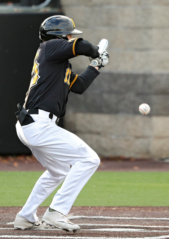 Iowa outfielder Paul Vossen (15) lays down a bunt single during the fifth inning of the first game of the Black and Gold Fall World Series at Duane Banks Field in Iowa City on Tuesday, Oct 15, 2019. (Stephen Mally/hawkeyesports.com)