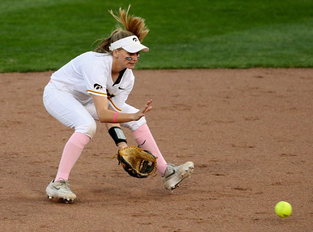 Iowa second baseman Aralee Bogar (2) fields a ground ball before throwing to first for an out during the third inning of their game against Iowa State at Pearl Field in Iowa City on Tuesday, Apr. 9, 2019. (Stephen Mally/hawkeyesports.com)