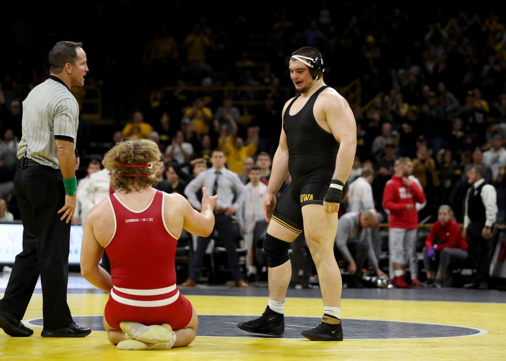 IowaÕs Tony Cassioppi wrestles WisconsinÕs Trent Hillger at heavyweight Sunday, December 1, 2019 at Carver-Hawkeye Arena. Cassioppi won the match 3-2. (Brian Ray/hawkeyesports.com)