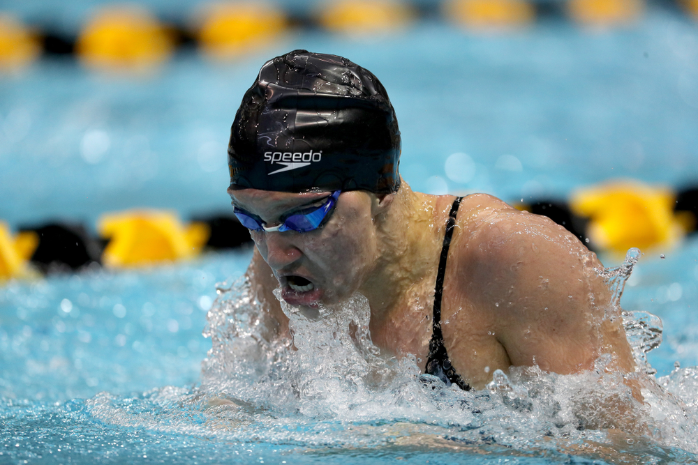 IowaÕs Sage Ohlensehlen competes in the 100 yard breaststroke against Notre Dame and Illinois Saturday, January 11, 2020 at the Campus Recreation and Wellness Center. (Brian Ray/hawkeyesports.com)