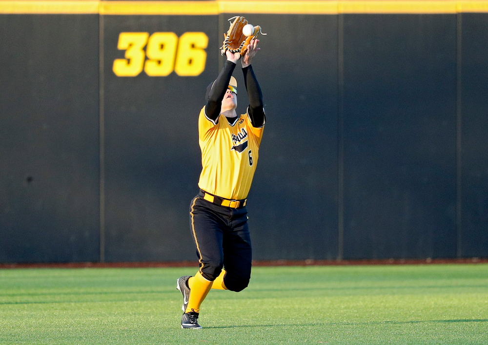 Iowa Hawkeyes center fielder Justin Jenkins (6) pulls in a fly ball for an out during the ninth inning of their game at Duane Banks Field in Iowa City on Tuesday, Apr. 2, 2019. (Stephen Mally/hawkeyesports.com)