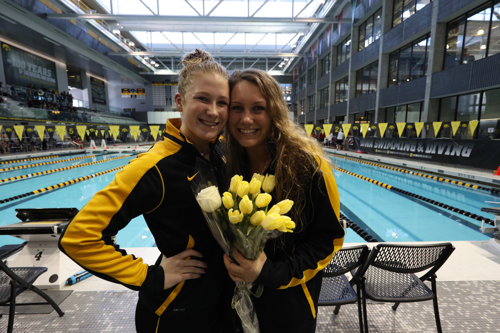 Abbey Schneider and Devin Jacobs during a double dual against Wisconsin and Northwestern Saturday, January 19, 2019 at the Campus Recreation and Wellness Center. (Brian Ray/hawkeyesports.com)