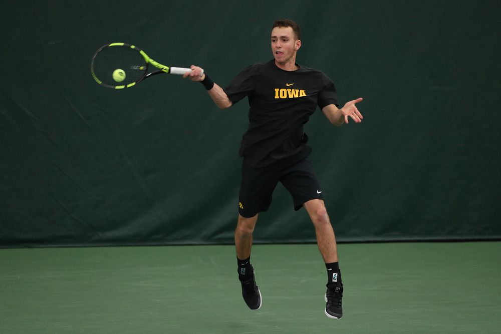 Iowa's Kareem Allaf against UMKC Friday, February 15, 2019 at the Hawkeye Tennis and Recreation Complex. (Brian Ray/hawkeyesports.com)