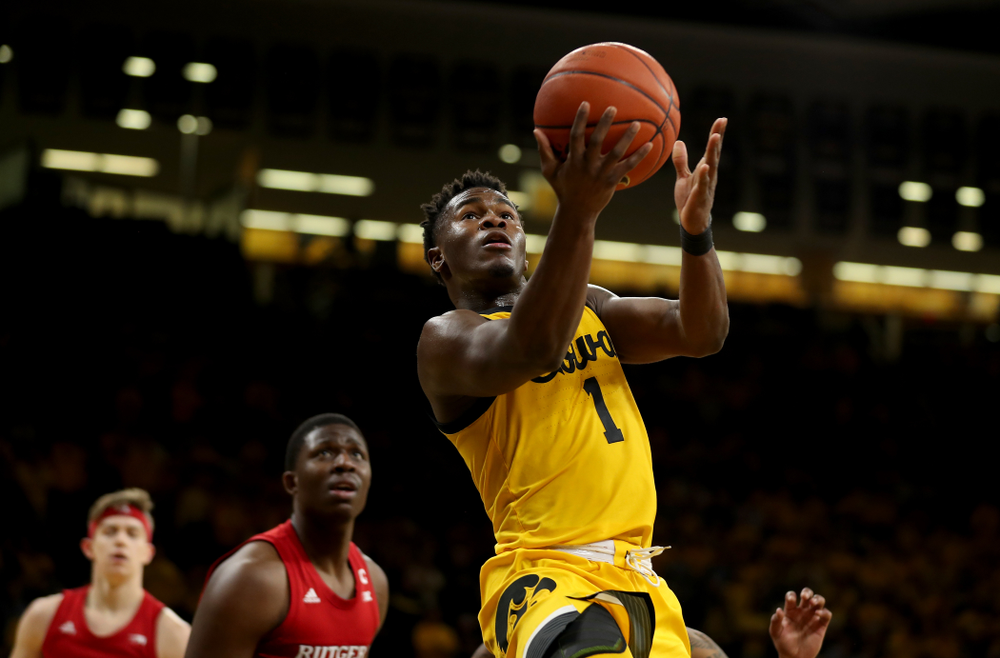 Iowa Hawkeyes guard Joe Toussaint (1) goes to the hoop against the Rutgers Scarlet Knights Wednesday, January 22, 2020 at Carver-Hawkeye Arena. (Brian Ray/hawkeyesports.com)