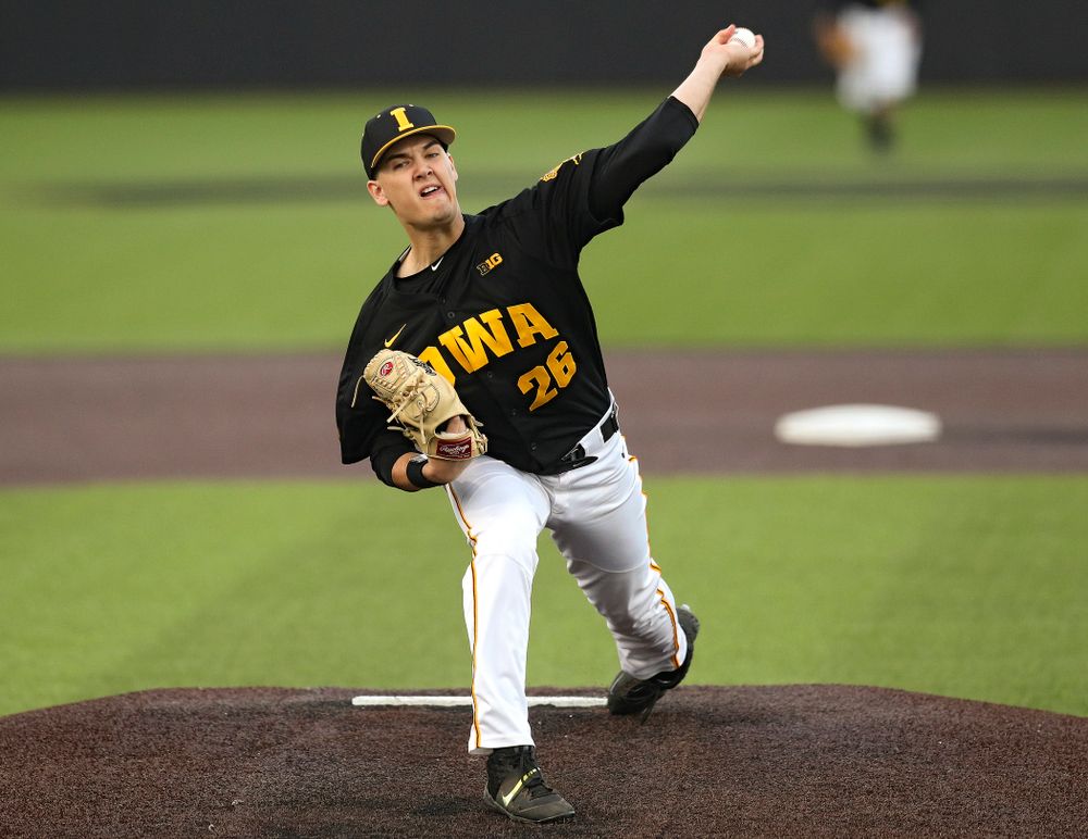 Iowa pitcher Adam Ketelsen (26) delivers to the plate during the eighth inning of their college baseball game at Duane Banks Field in Iowa City on Tuesday, March 10, 2020. (Stephen Mally/hawkeyesports.com)