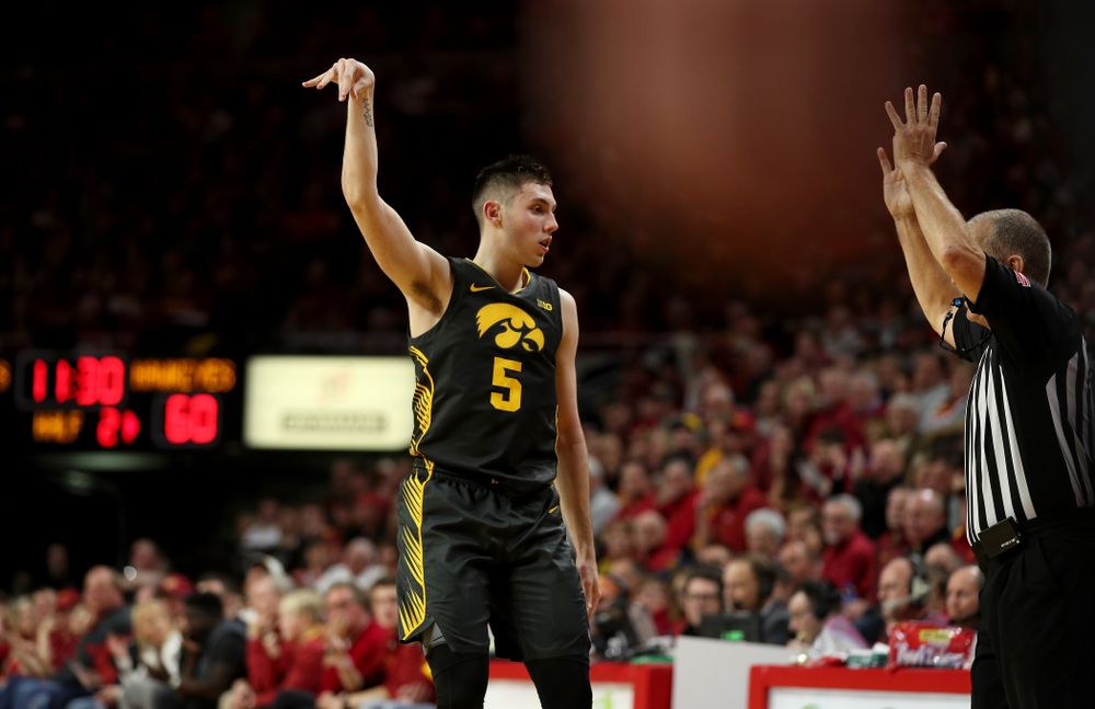 Iowa Hawkeyes guard CJ Fredrick (5) knocks down a three point basket against the Iowa State Cyclones Thursday, December 12, 2019 at Hilton Coliseum in Ames, Iowa(Brian Ray/hawkeyesports.com)