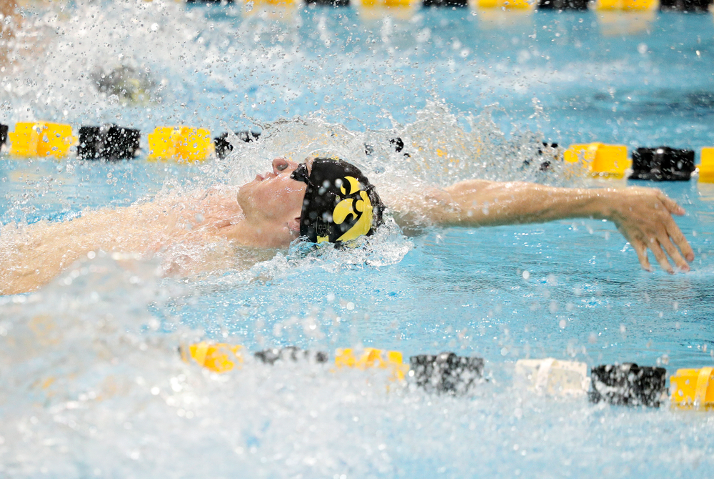 Iowa’s John Colin swims the men’s 50-yard backstroke event during their meet against Michigan State at the Campus Recreation and Wellness Center in Iowa City on Thursday, Oct 3, 2019. (Stephen Mally/hawkeyesports.com)